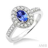 6x4mm Oval Cut Tanzanite and 1/4 Ctw Round Cut Diamond Ring in 14K White Gold