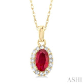 5x3 MM Oval Shape Ruby and 1/20 Ctw Single Cut Diamond Halo Precious Pendant with Chain in 10K Yellow Gold