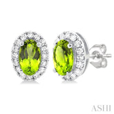 5x3 MM Oval Shape Peridot and 1/8 Ctw Round Cut Diamond Halo Semi-Precious Stud Earrings in 10K White Gold