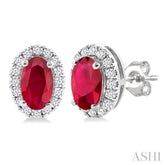 5x3 MM Oval Shape Ruby and 1/8 Ctw Round Cut Diamond Halo Precious Stud Earrings in 10K White Gold
