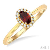 5x3 MM Oval Shape Garnet and 1/20 Ctw Single Cut Diamond Halo Semi-Precious Ring in 14K Yellow Gold