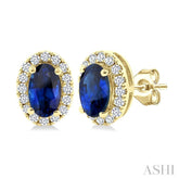 5x3 MM Oval Shape Sapphire and 1/8 Ctw Round Cut Diamond Halo Precious Stud Earrings in 14K Yellow Gold