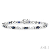 5x3 MM Oval Cut Sapphire and 1/10 Ctw Round Cut Diamond Bracelet in 10K White Gold