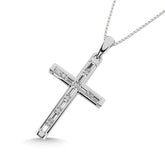 Diamond 1/6 Ct.Tw. Round and Baguette Cut Cross Pendant in 10K White Gold
