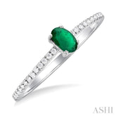 5x3 MM Oval Cut Emerald and 1/10 Ctw Petite Round Cut Diamond Precious Fashion Ring in 10K White Gold