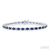 4X3 MM Oval Cut Sapphire and 1/3 Ctw Round Cut Diamond Precious Bracelet in 14K White Gold