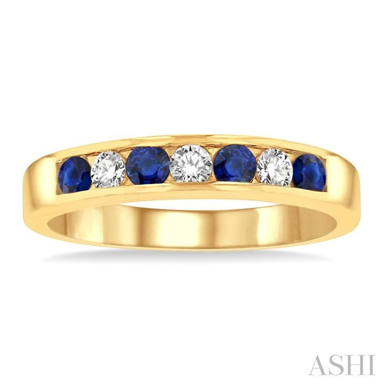2.5 MM Round Cut Sapphire and 1/5 Ctw Channel Set Round Cut Diamond Band in 14K Yellow Gold 2.5 MM Round Cut Sapphire and 1/5 Ctw Channel Set Round Cut Diamond Band in 14K Yellow Gold