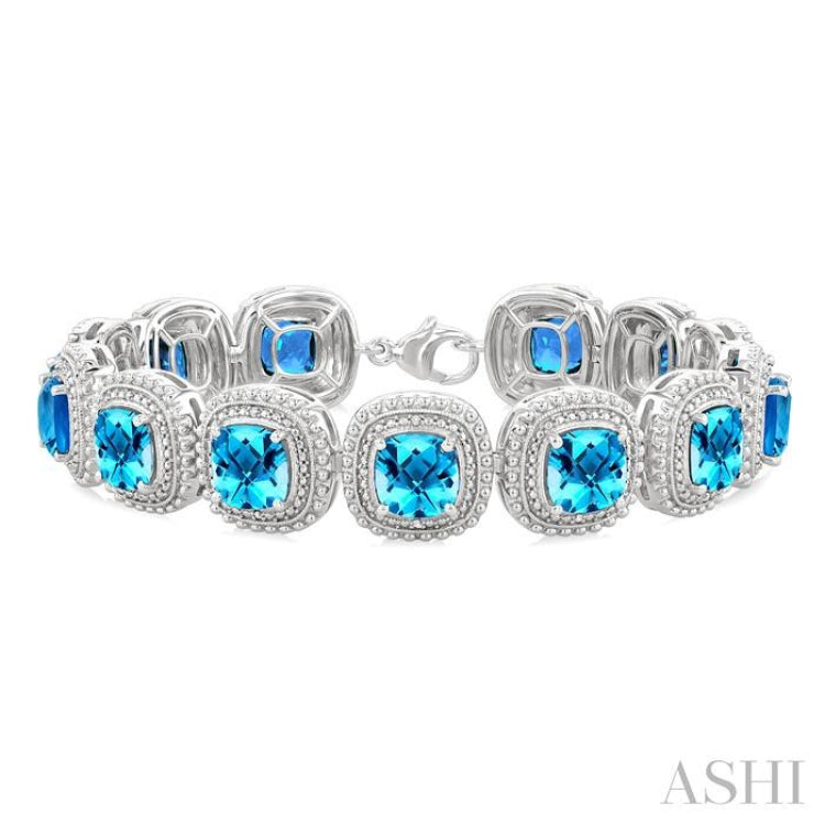 7 MM Oval Shape Blue Topaz and 1/10 Ctw Round Cut Diamond Semi-Precious Bracelet in Sterling Silver