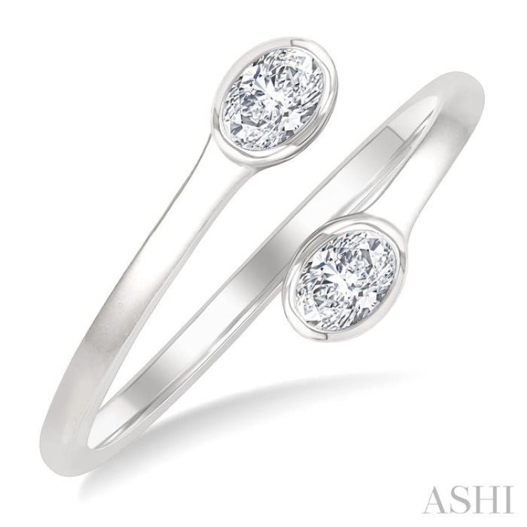 1/5 Ctw Split Single Coil Bezel Set Oval Cut Diamond Open Fashion Ring in 14K White Gold