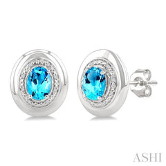 7X5 MM Oval Shape Blue Topaz and 1/20 Ctw Round Cut Diamond Semi-Precious Earrings in Sterling Silver