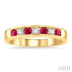 2.5 MM Round Cut Ruby and 1/5 Ctw Channel Set Round Cut Diamond Band in 14K Yellow Gold