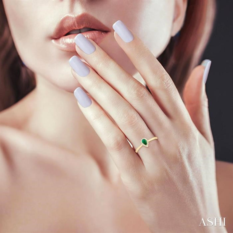 5x3 MM Pear Shape Emerald and 1/20 Ctw Single Cut Diamond Halo Precious Ring in 10K Yellow Gold