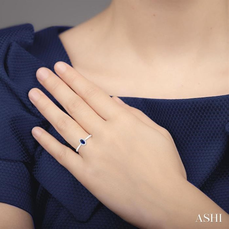 5x3 MM Oval Shape Sapphire and 1/20 Ctw Single Cut Diamond Halo Precious Ring in 10K White Gold