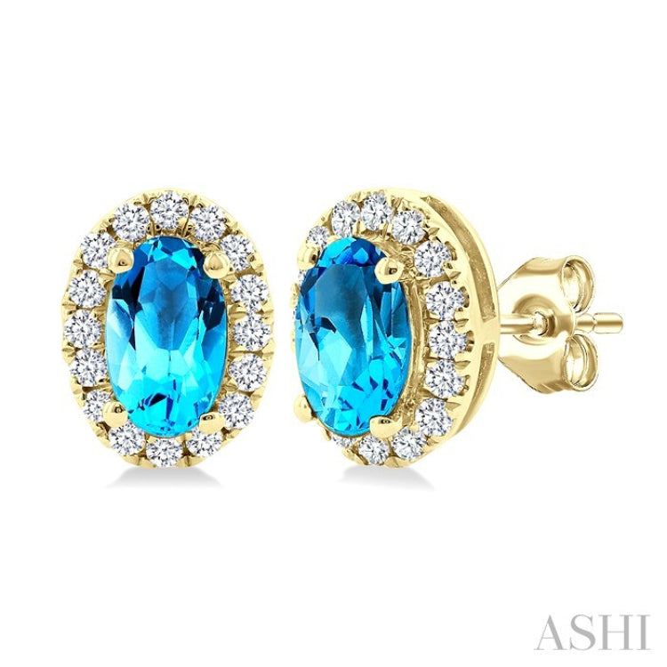 5x3 MM Oval Shape Blue Topaz and 1/8 Ctw Round Cut Diamond Halo Semi-Precious Stud Earrings in 14K Yellow Gold