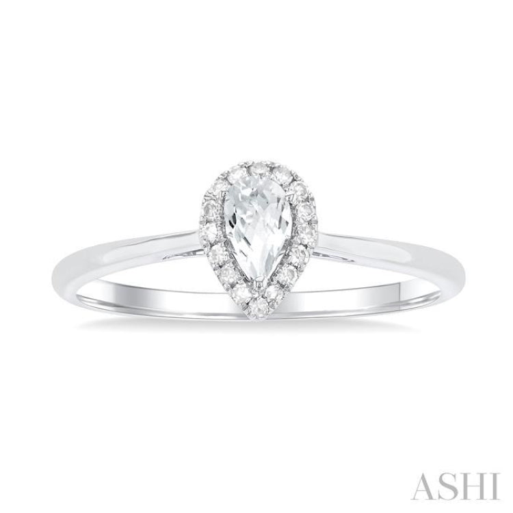 5x3 MM Pear Shape White Topaz and 1/20 Ctw Single Cut Diamond Halo Semi-Precious Ring in 14K White Gold