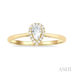 5x3 MM Pear Shape White Topaz and 1/20 Ctw Single Cut Diamond Halo Semi-Precious Ring in 10K Yellow Gold