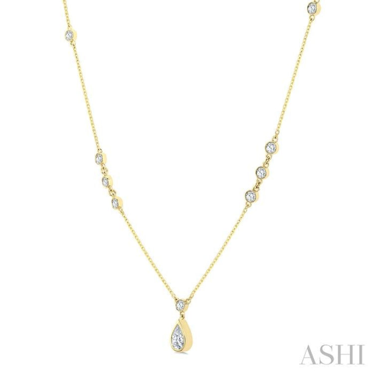 1/2 Ctw Bezel Set Pear and Round Cut Diamond Drop Necklace in 14K Yellow Gold