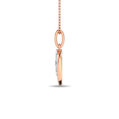 Diamond 1/10 Ct.Tw. Round and Baguette Fashion Pendant in 14K Two Tone Gold
