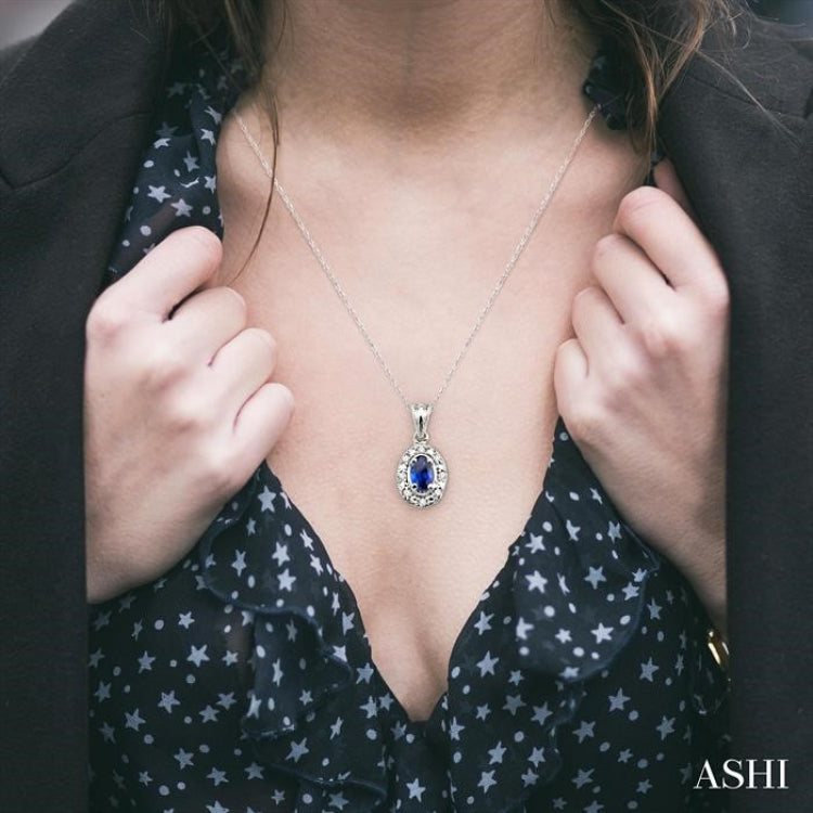 5x3 MM Oval Shape Sapphire and 1/20 Ctw Round Cut Diamond Pendant in 10K White Gold with Chain