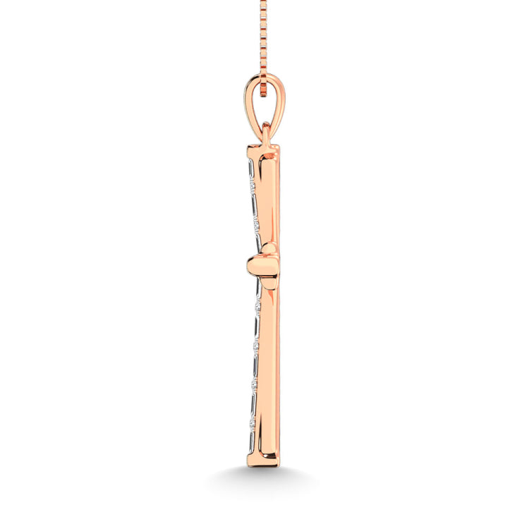 Diamond 1/6 Ct.Tw. Round and Baguette Cut Cross Pendant in 10K White Gold