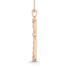 Diamond 1/6 Ct.Tw. Round and Baguette Cut Cross Pendant in 10K White Gold