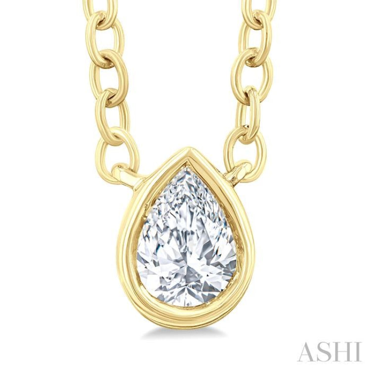 1/6 Ctw Petite Bezel Set Pear Cut Diamond Fashion Pendant With Chain in 10K Yellow Gold