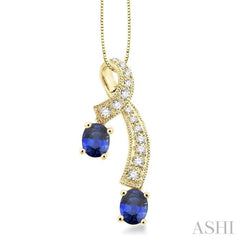 5x4 MM Oval Cut Sapphire and 1/6 Ctw Round Cut Diamond Precious Pendant in 14K Yellow Gold with Chain